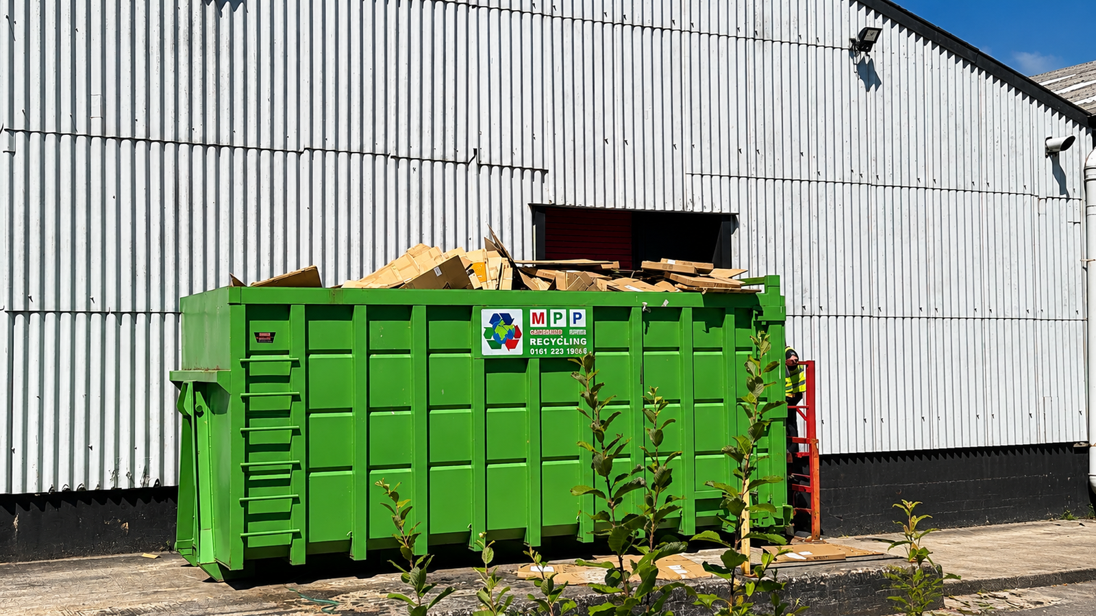 Skip hire delivery truck at Manchester Paper Plastic Ltd